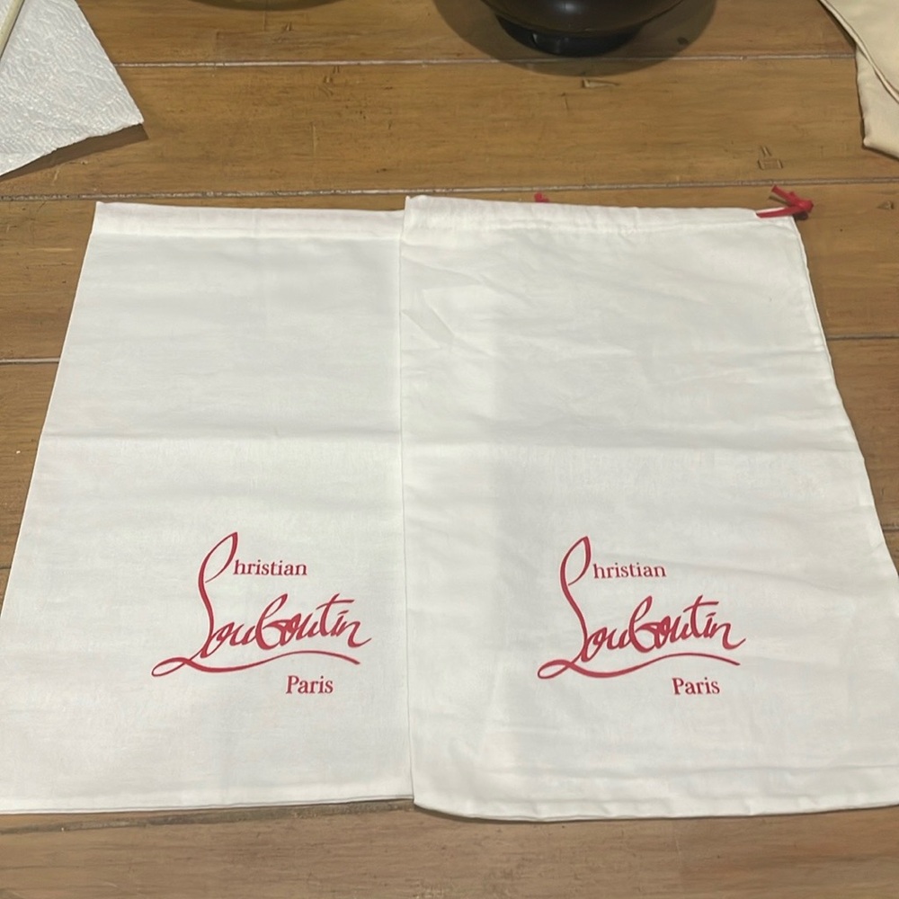 Two Christian Louboutin dust bag